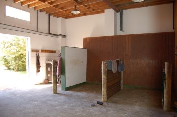 Salle de pansage Haras de Meniljean